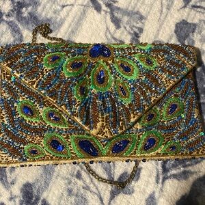 EUC evening clutch peacock design